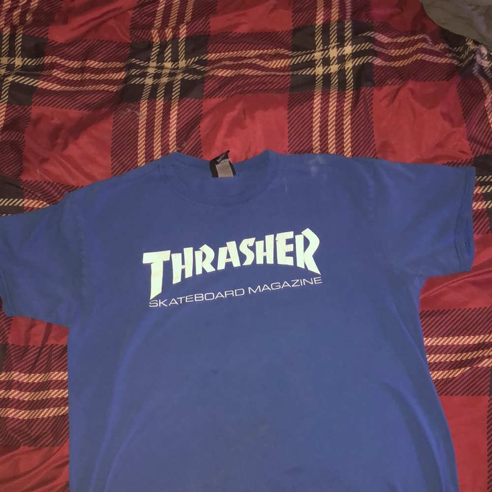 It’s a blue Thrasher skate shirt Size Large